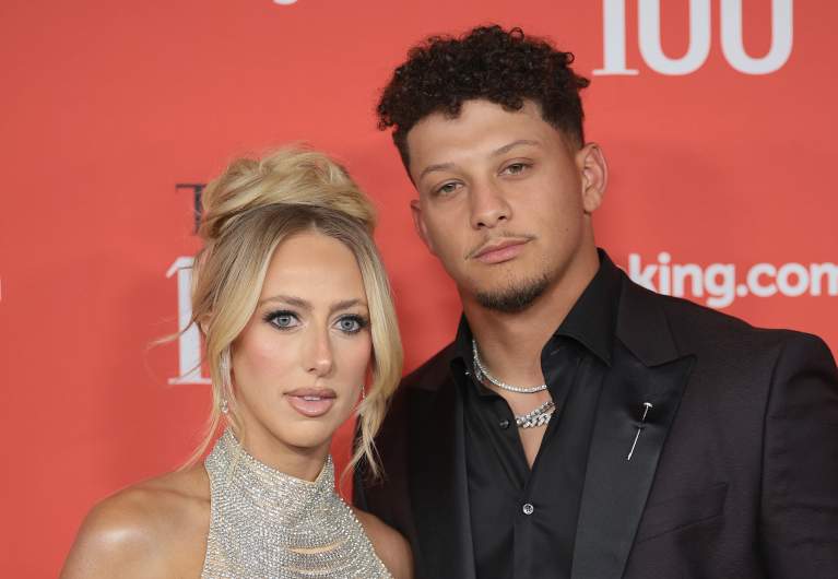 Patrick Mahomes and Brittany Mahomes poses together in April 2024.