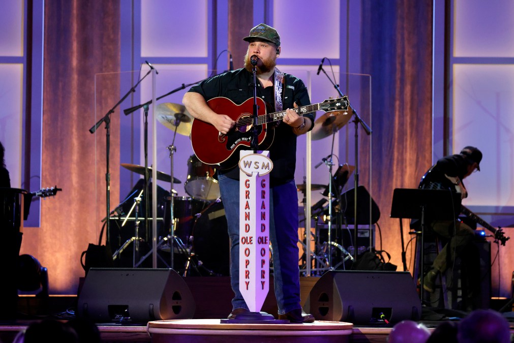 Luke Combs playing guitar