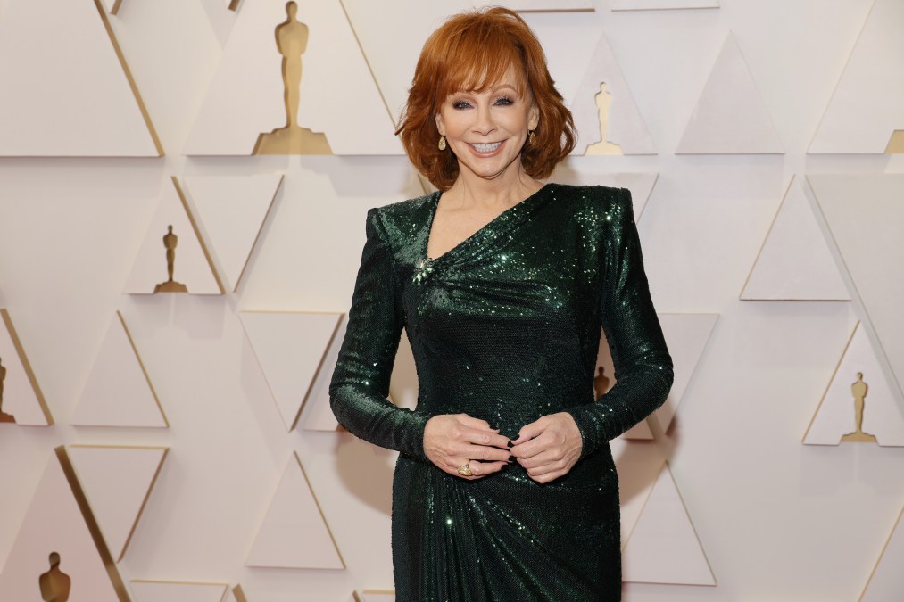 Reba McEntire posing in a sparkly dress