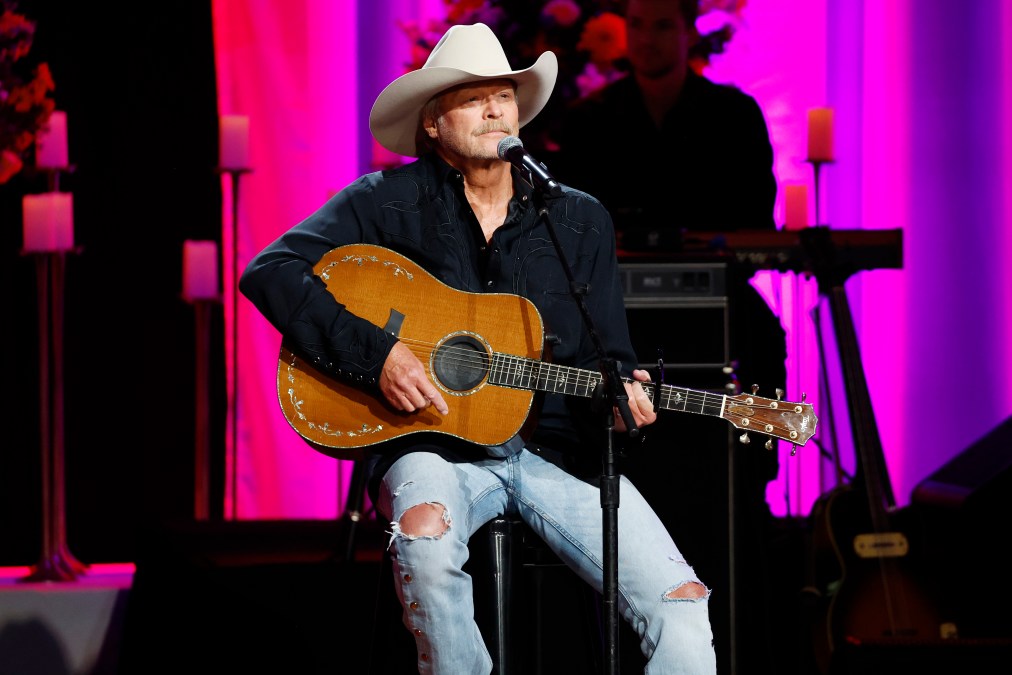 Alan Jackson playing guitar