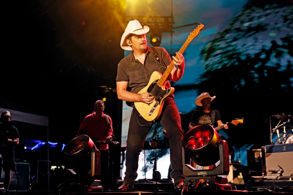 Brad Paisley playing guitar on stage