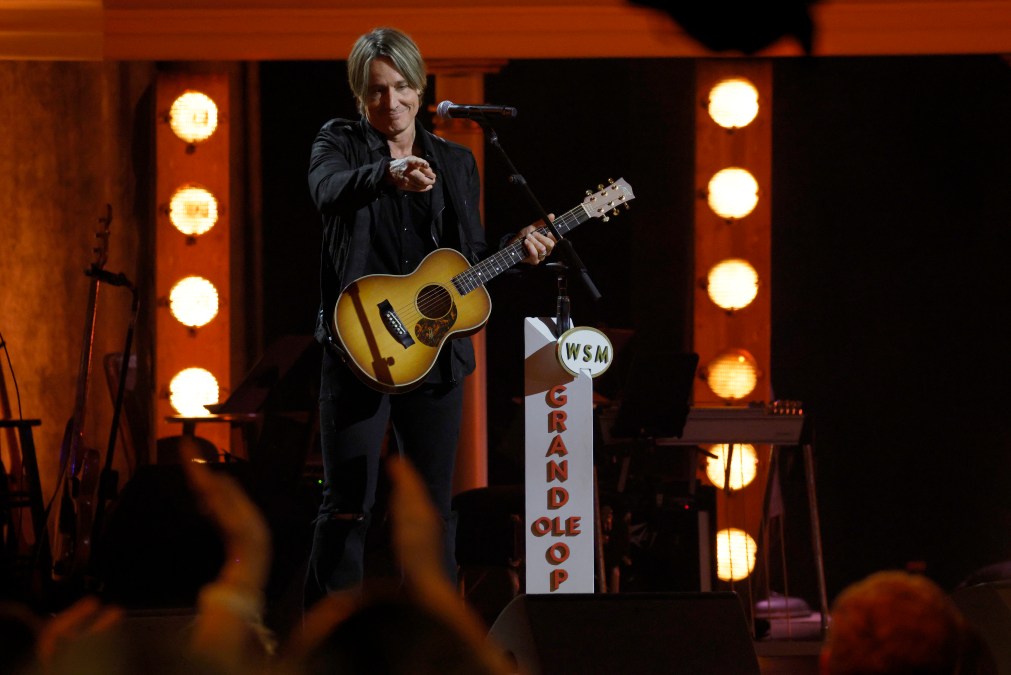 Keith Urban holding a guitar