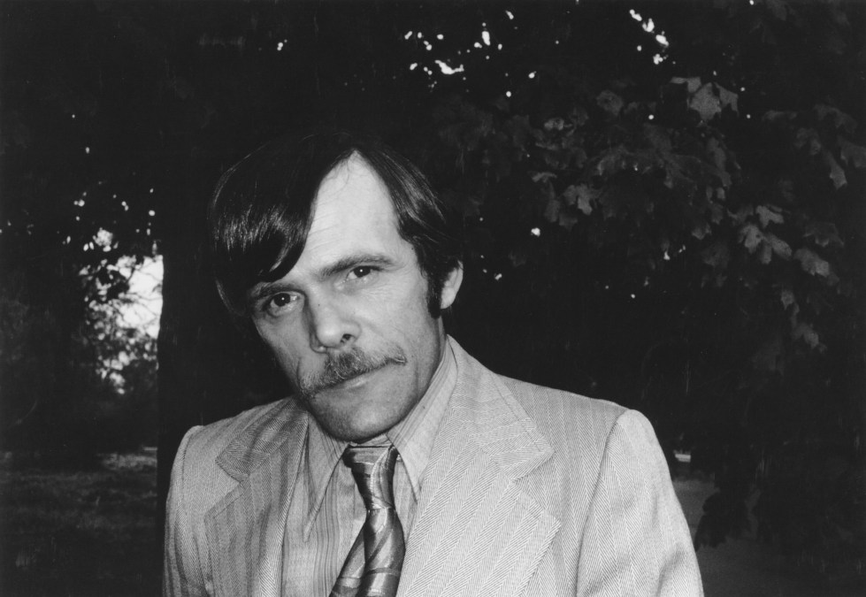 Johnny Paycheck wearing a suit