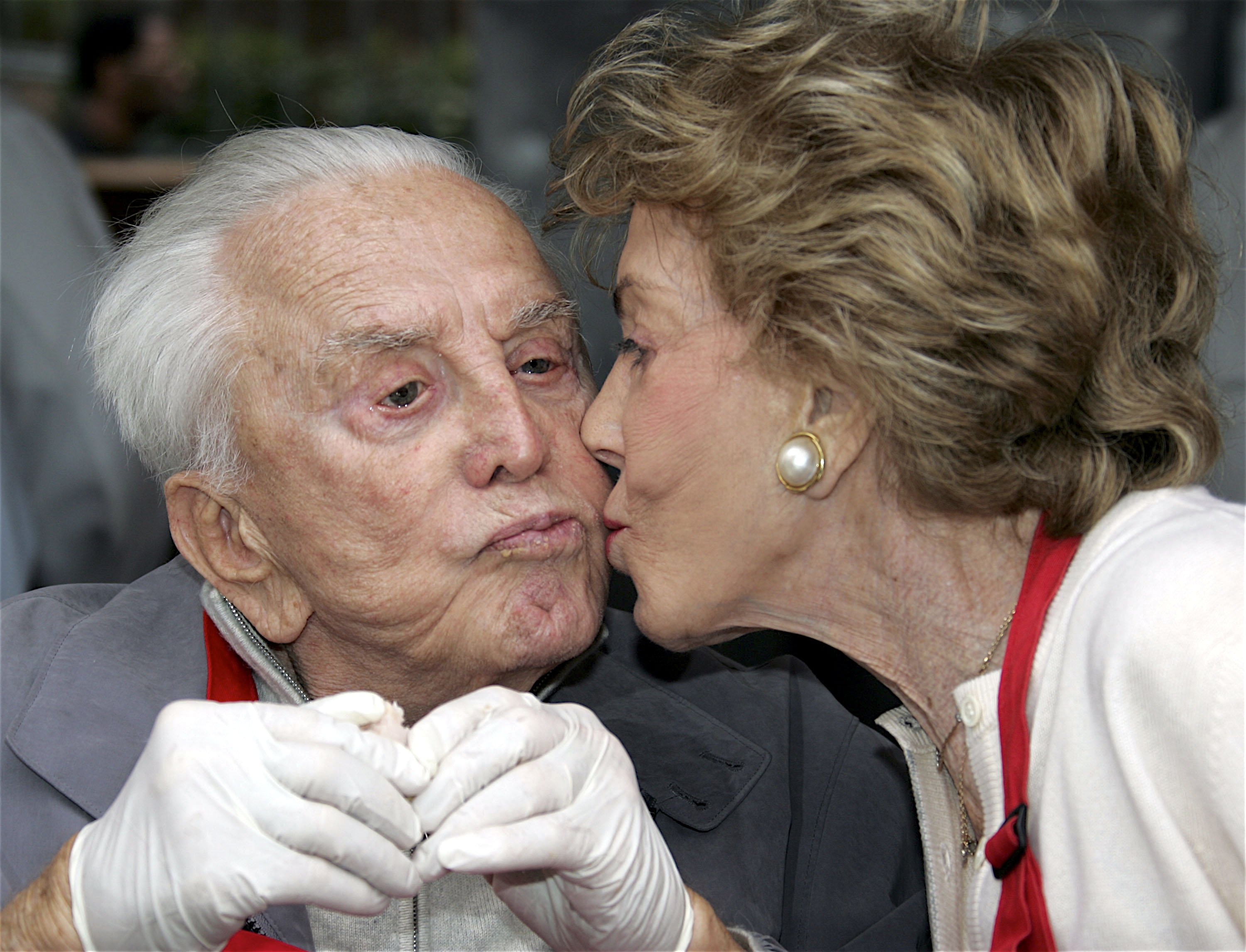 Kirk Douglas Kissing Wife Anne