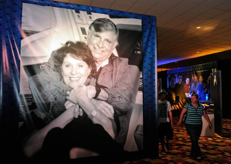 A double-sided vinyl scrim of Gene and Majel Roddenberry is displayed at Julien's Auctions annual summer sale