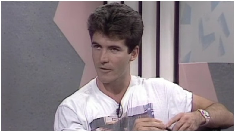 Scott Disick wearing a black shirt.