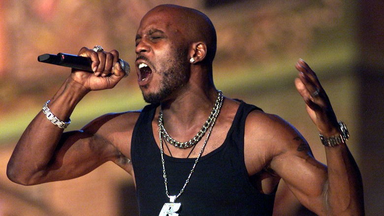DMX holding a microphone.